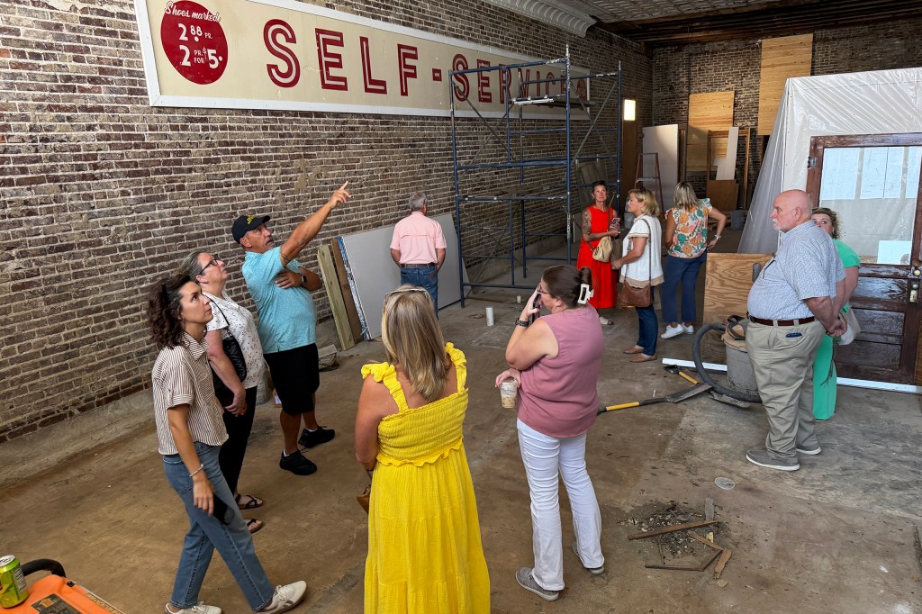During a tour of buildings in downtown Glenwood, the group went through a former shoe store that is being cleaned out and will become a shop that sells homemade soaps. All photos: Micheal Hibblen