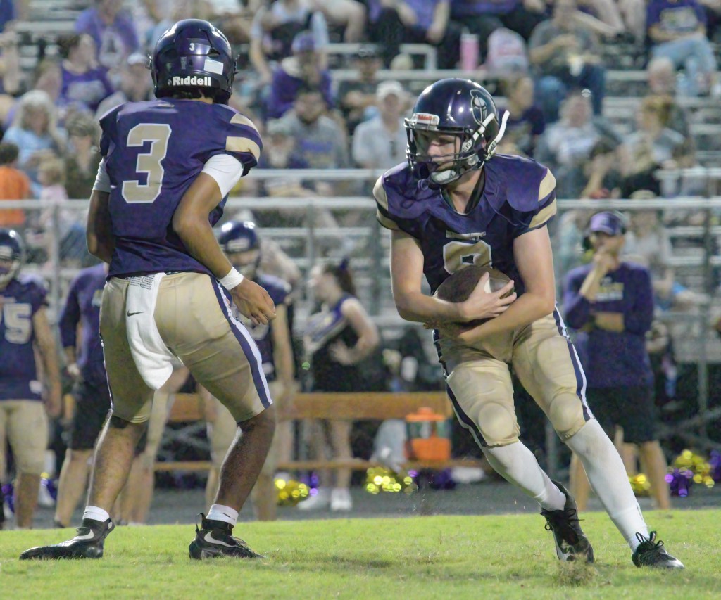 Centerpoint running back Cayden Lambeth receives a handoff from quarterback Tony Valdez. All photos: Paul Shepard