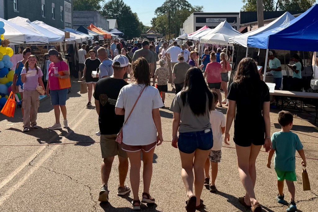 Festivalgoers walk on S. 2nd Street in Glenwood Saturday, Sept. 5.
