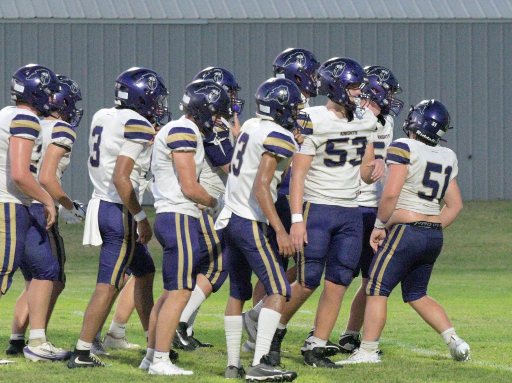 The Centerpoint team breaking a huddle before the next play.