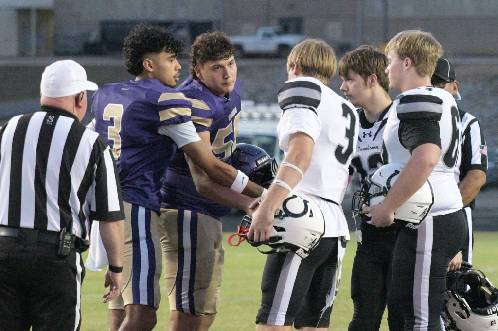 Captains for the Knights, Tony Valdez and Parker Bailey meet at midfield for the coin toss to begin the game. All photos: Paul Shepard