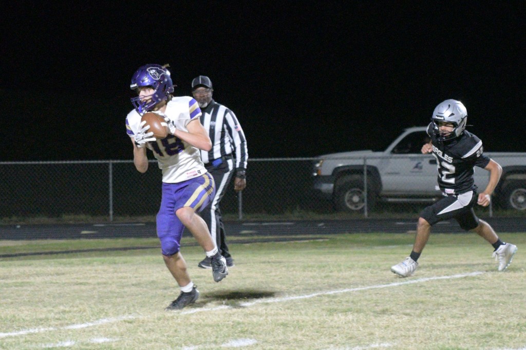 Receiver Ely Welch catches a 16-yard touchdown pass from quarterback Tony Valdez.